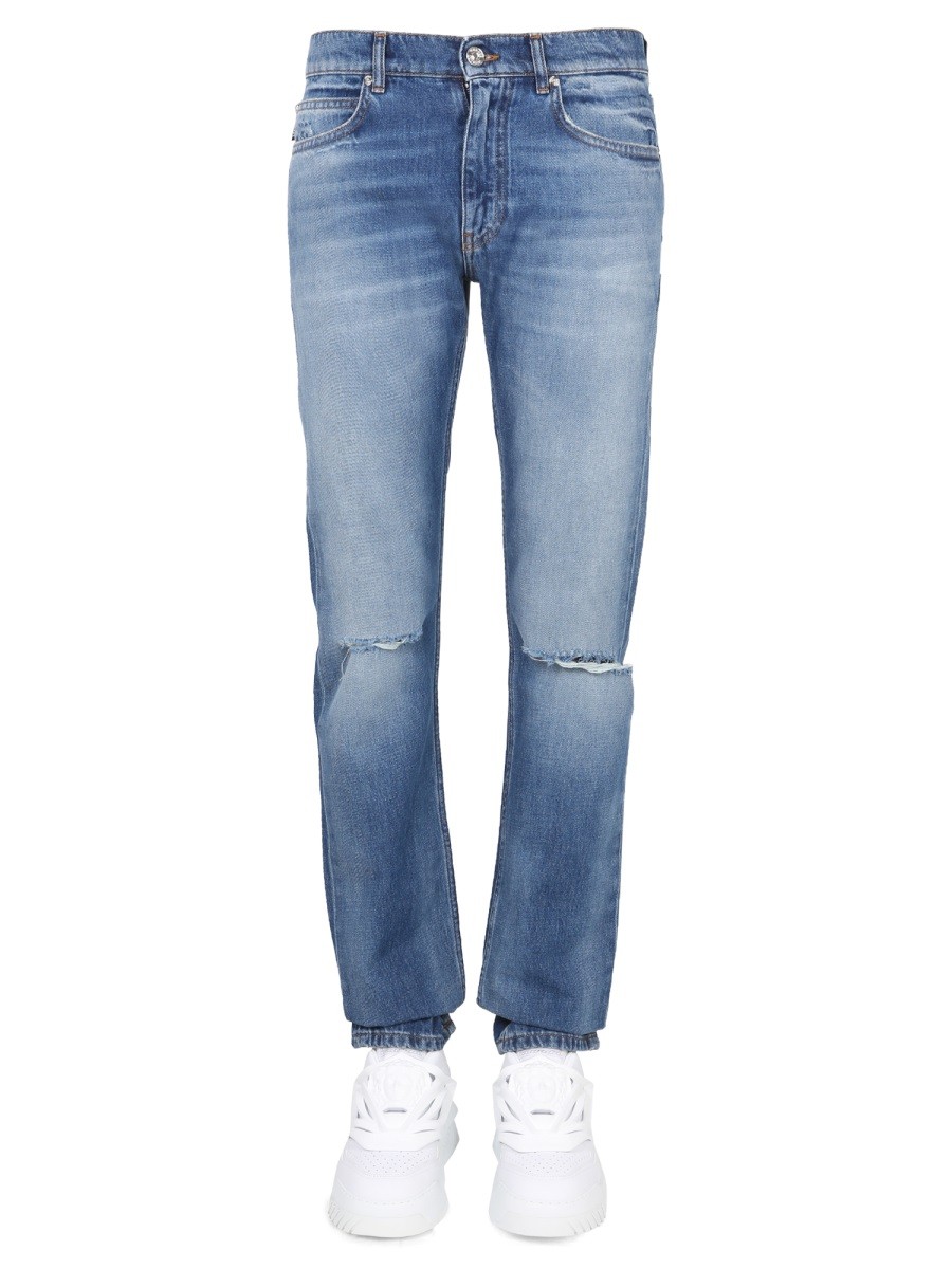 JEANS CON PATCH LOGO