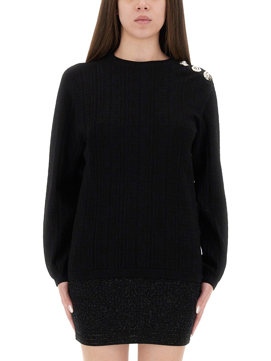 KNITTED TOPS.
