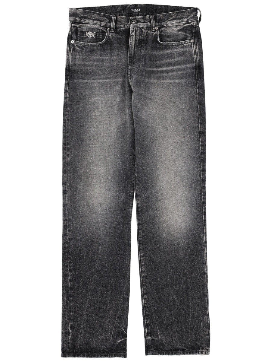 JEANS WITH "MEDUSA" DETAIL