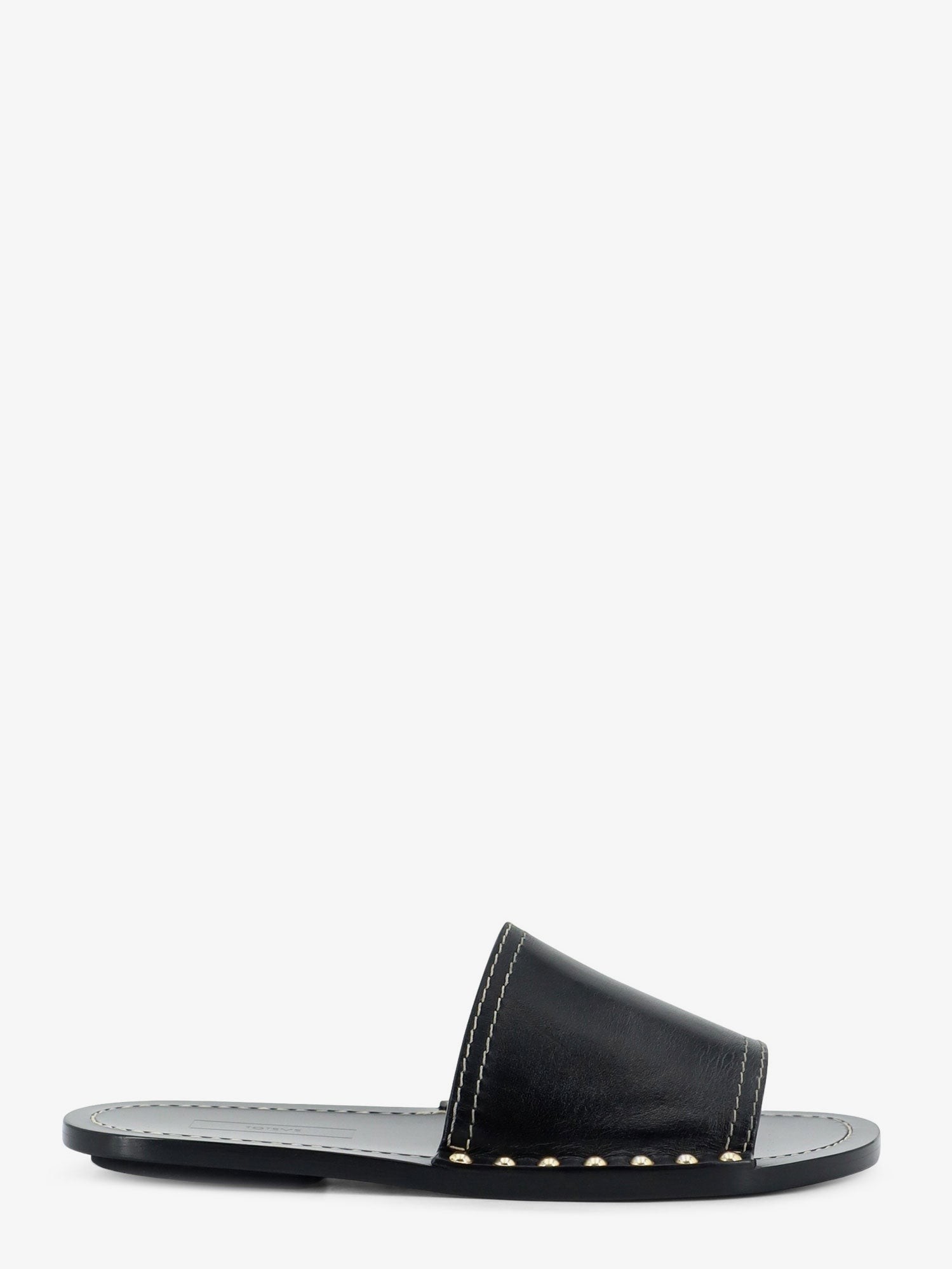 Low leather sandals with metal studs on the sides