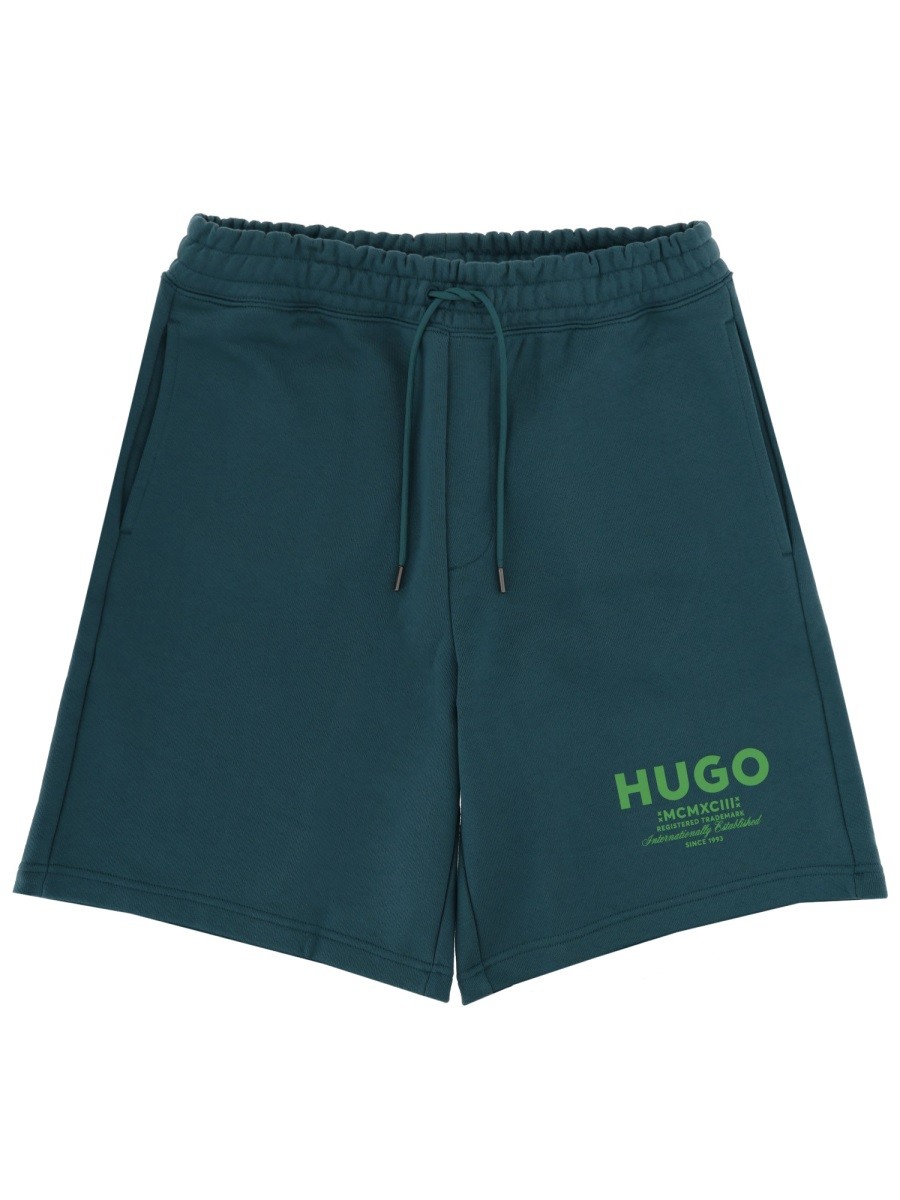 SHORTS CON LOGO